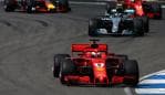 HOCKENHEIM, GERMANY - JULY 22: Sebastian Vettel of Germany driving the (5) Scuderia Ferrari SF71H leads Valtteri Bottas driving the (77) Mercedes AMG Petronas F1 Team Mercedes WO9 on track during the Formula One Grand Prix of Germany at Hockenheimring on July 22, 2018 in Hockenheim, Germany. (Photo by Charles Coates/Getty Images)